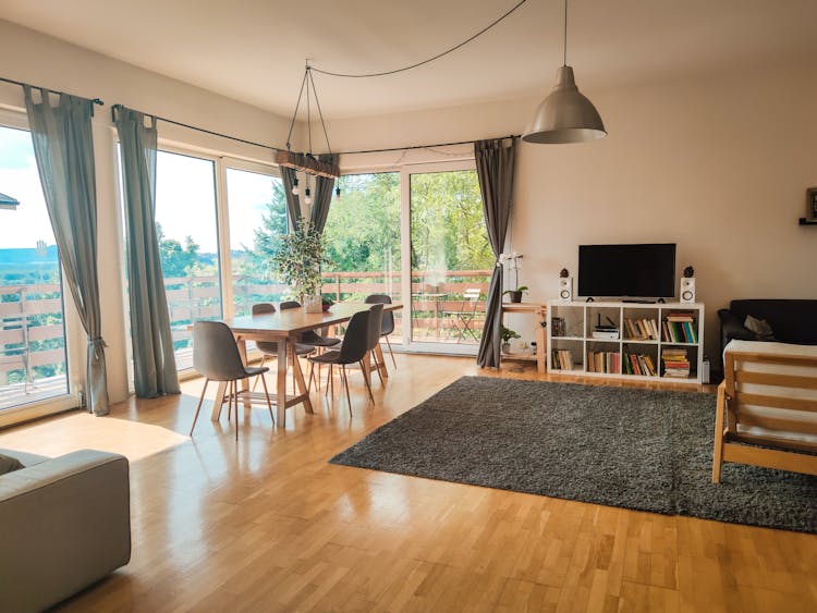 A Cozy Living Room With Glass Doors