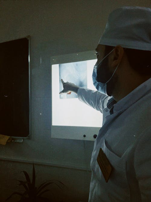 Doctor Looking at an X-Ray 