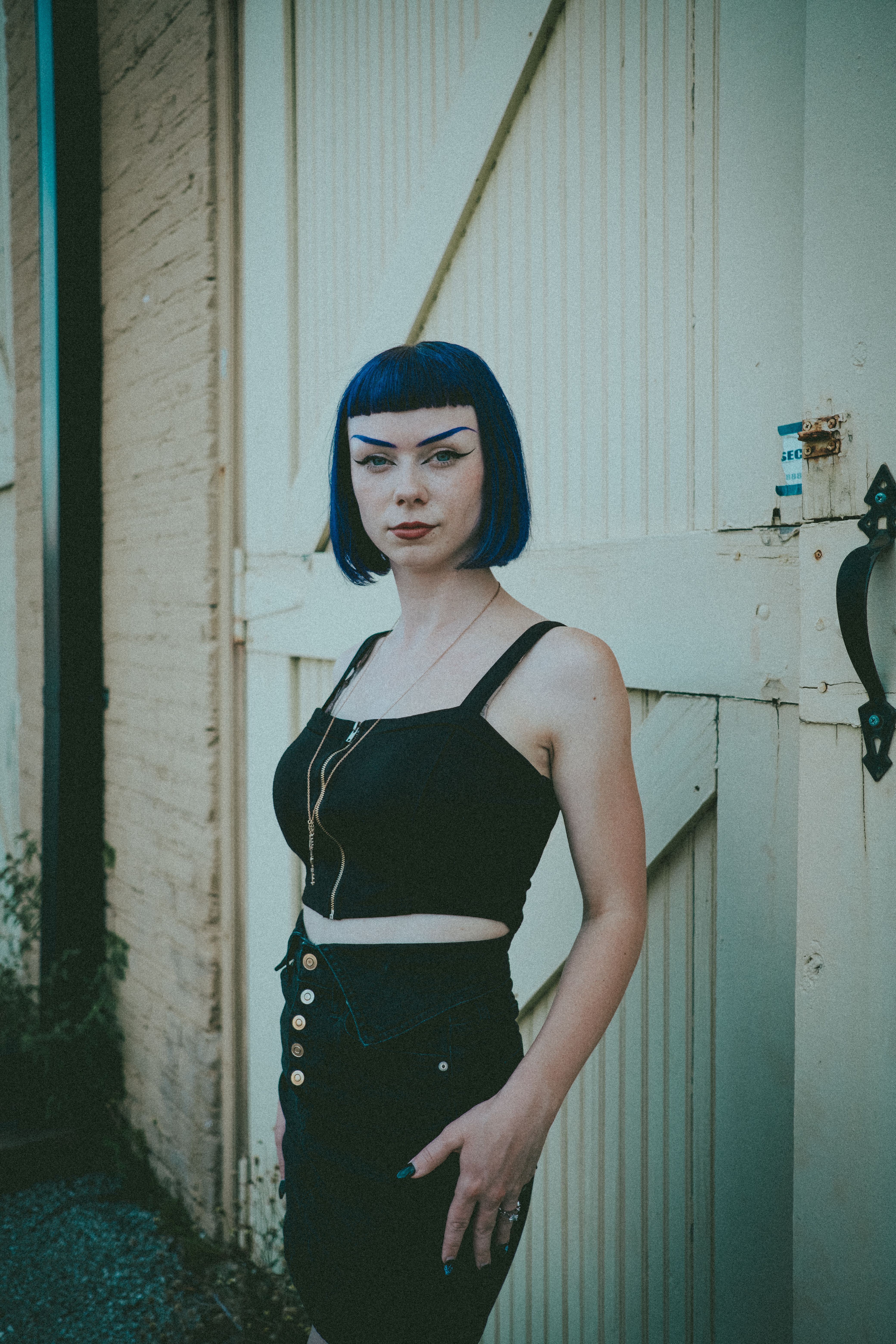 Stylish Woman in Black Top and a Skirt · Free Stock Photo