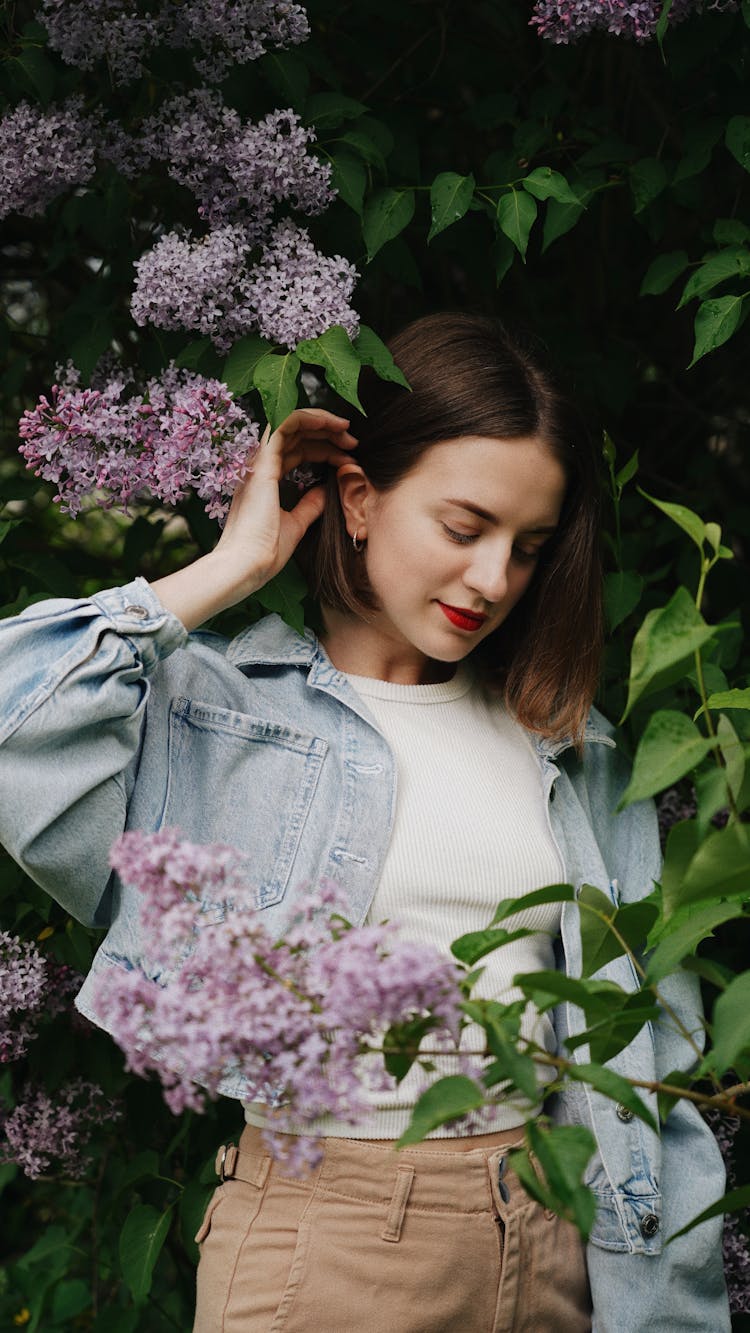 Portrait Of Woman Standing Under Elderberry Tree