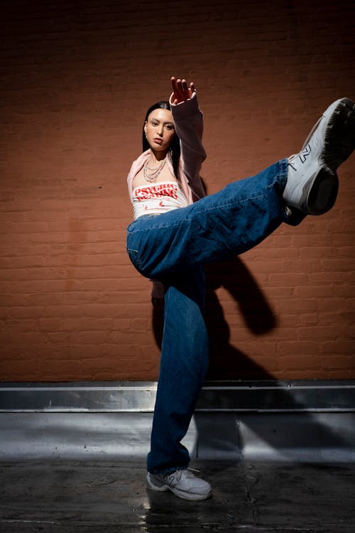 Young Woman in Trendy Clothing Posing 