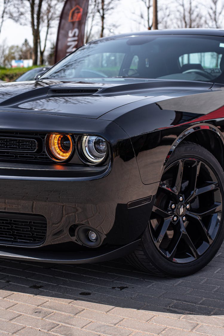 A Black Car Parked On The Street