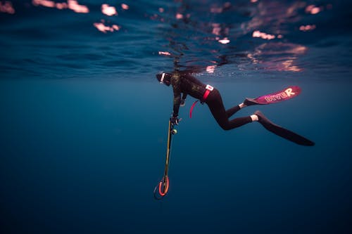 Diver Swimming under Water