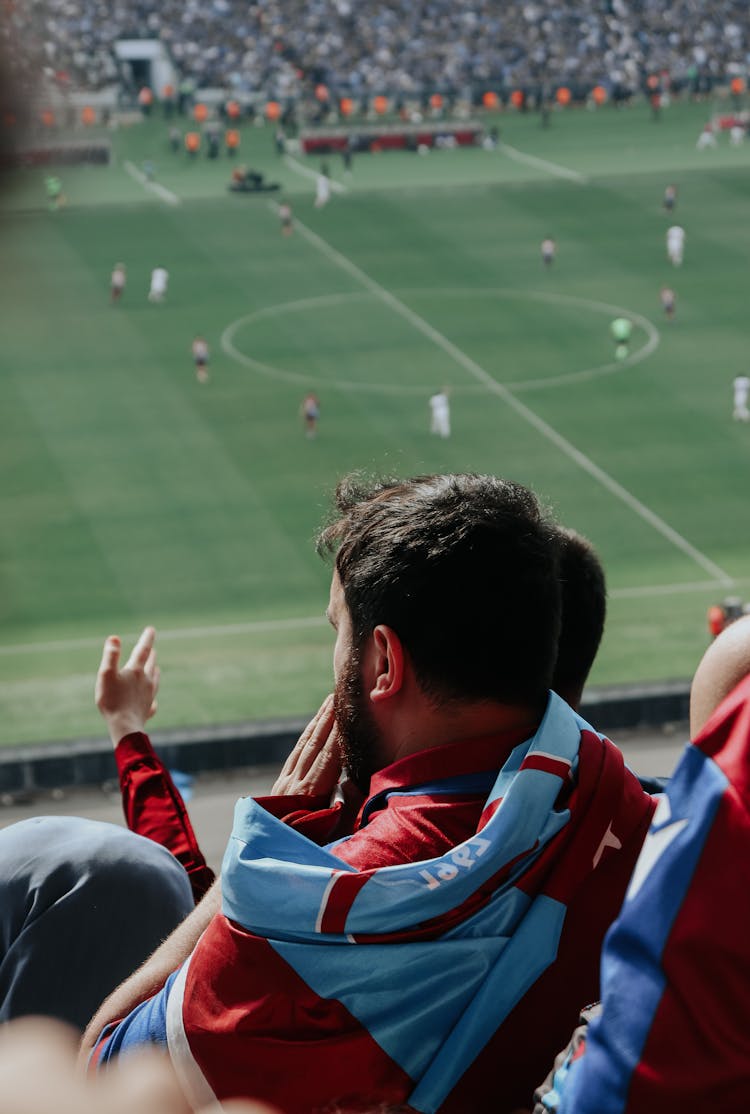 A Bearded Man Watching A Football Game