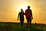 Two People Walking on the Dike