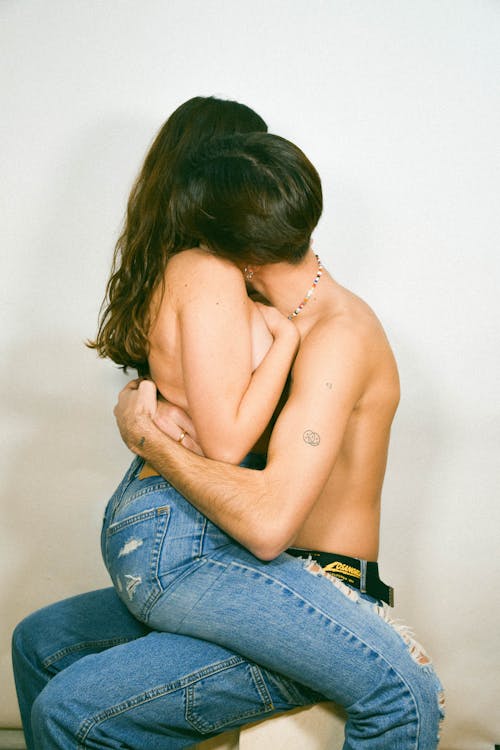 Topless Couple hugging each other 