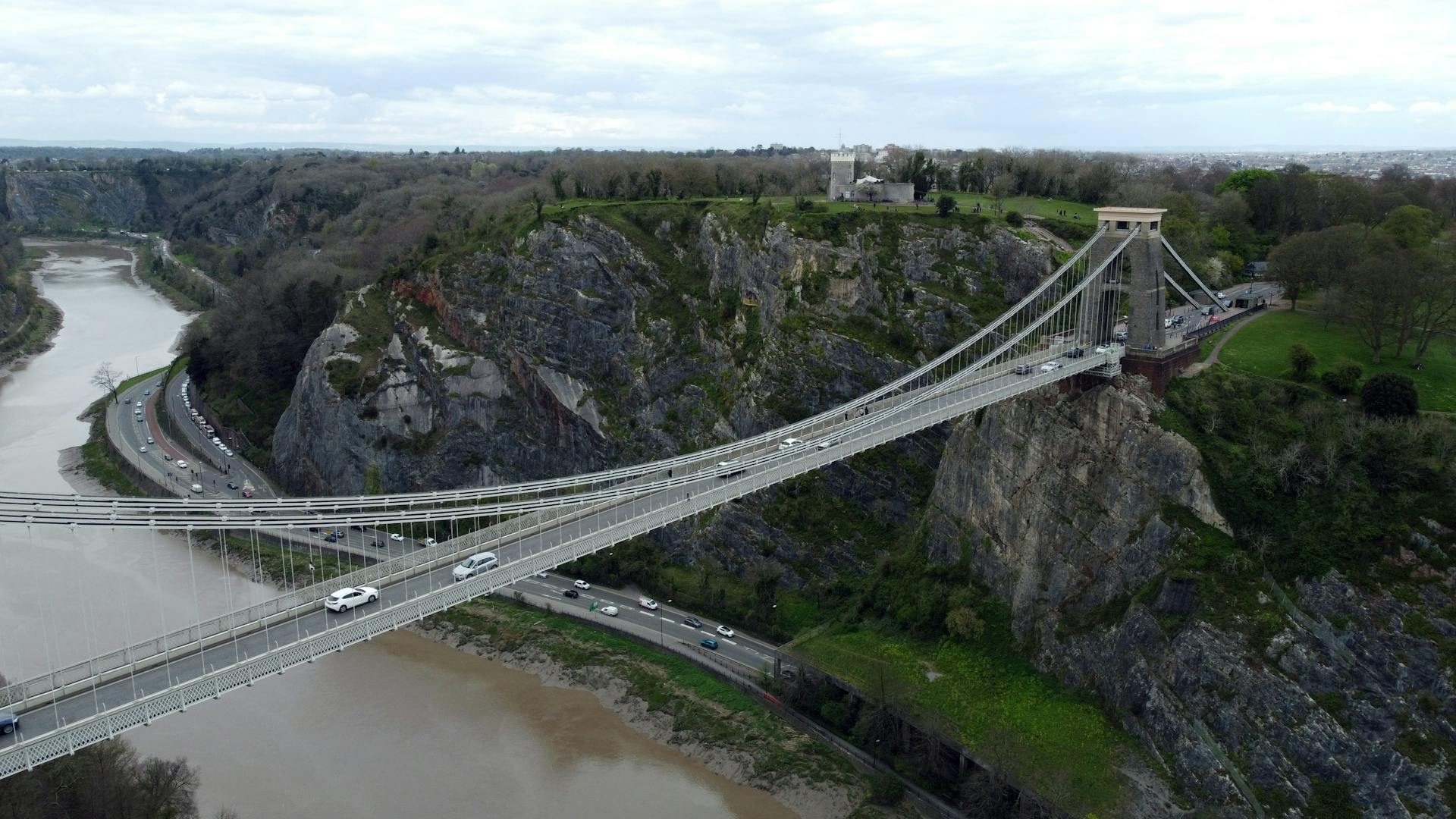 Scenic aerial view of the iconic Clifton Suspension Bridge spanning the Avon Gorge in Bristol, England.