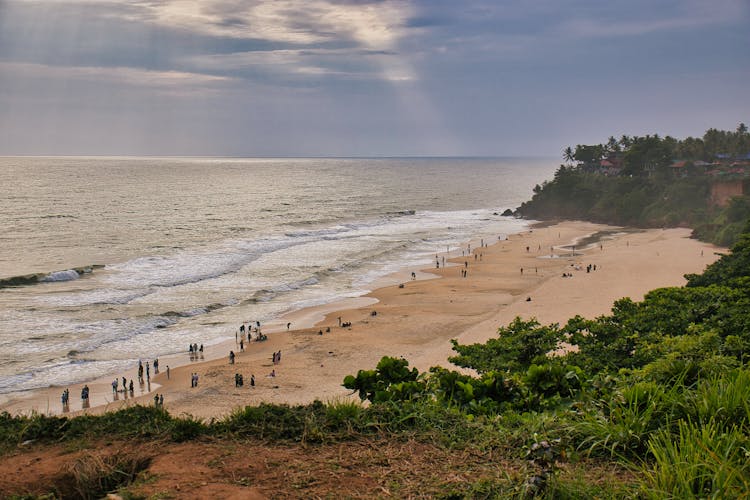 People On A Summer Vacation At The Beach