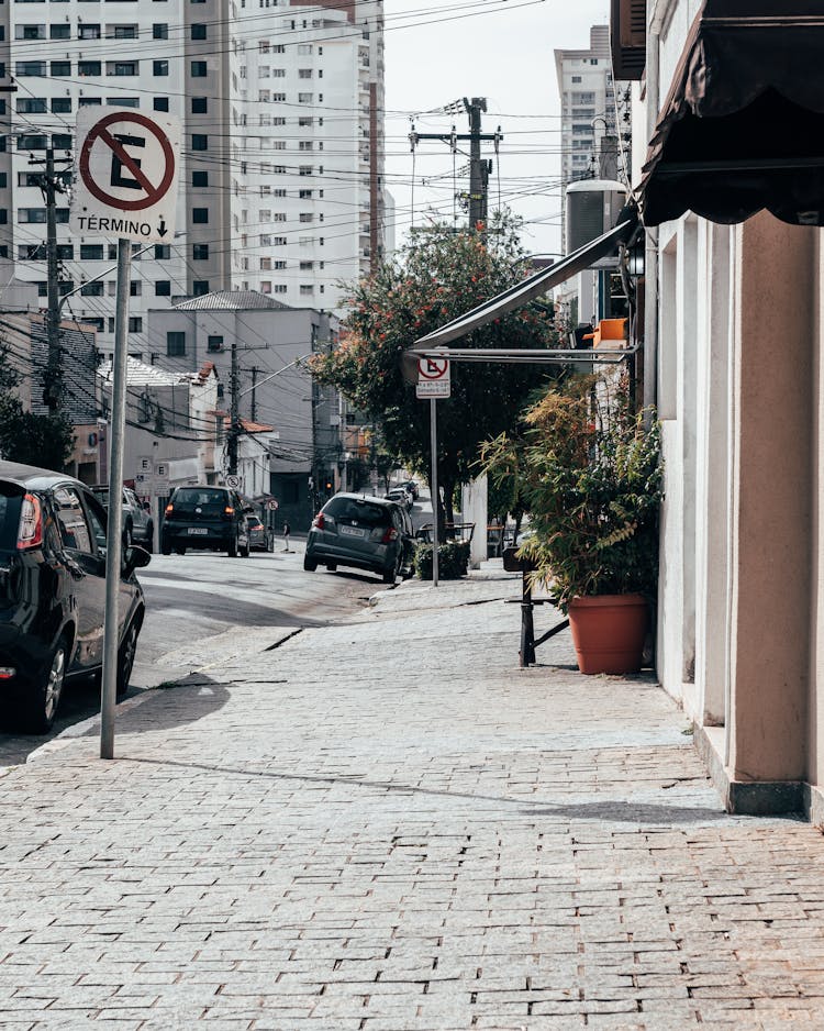 Cars Parked On The Street Near Buildings