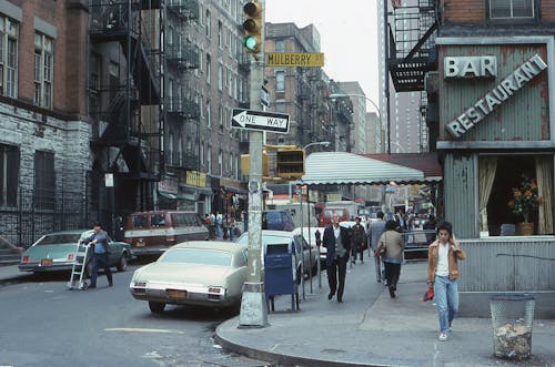 People Walking on the Sidewalk