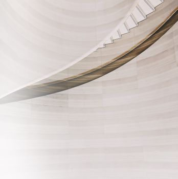 A modern minimalist spiral staircase with elegant curves in Singapore.