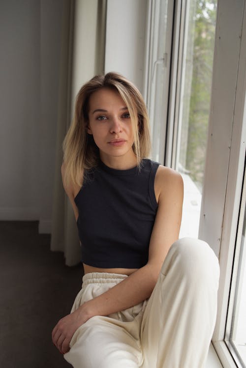 Blonde Woman in Black Tank Top