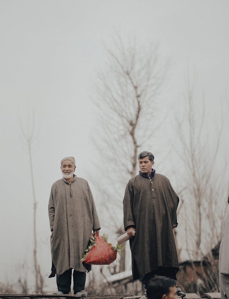 Elderly Men Walking Together