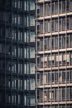 Close-up of a modern glass facade in Hamburg, capturing architectural details.