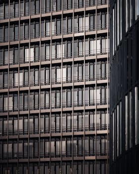 Geometric facade of a modern highrise building in Hamburg, Germany.