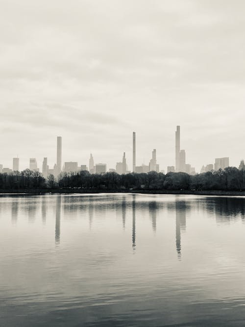 Foto profissional grátis de arquitetura, céu nublado, cidade