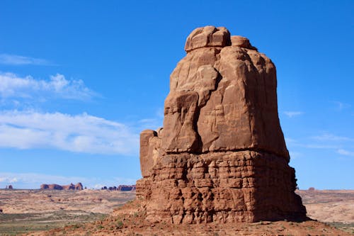 Brown Rock Formation Under Blue Sky