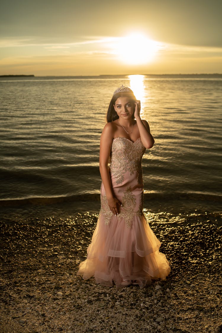 Beautiful Woman In Dress On The Beach