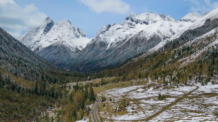 Aerial View Of A Mountain Valley Road 