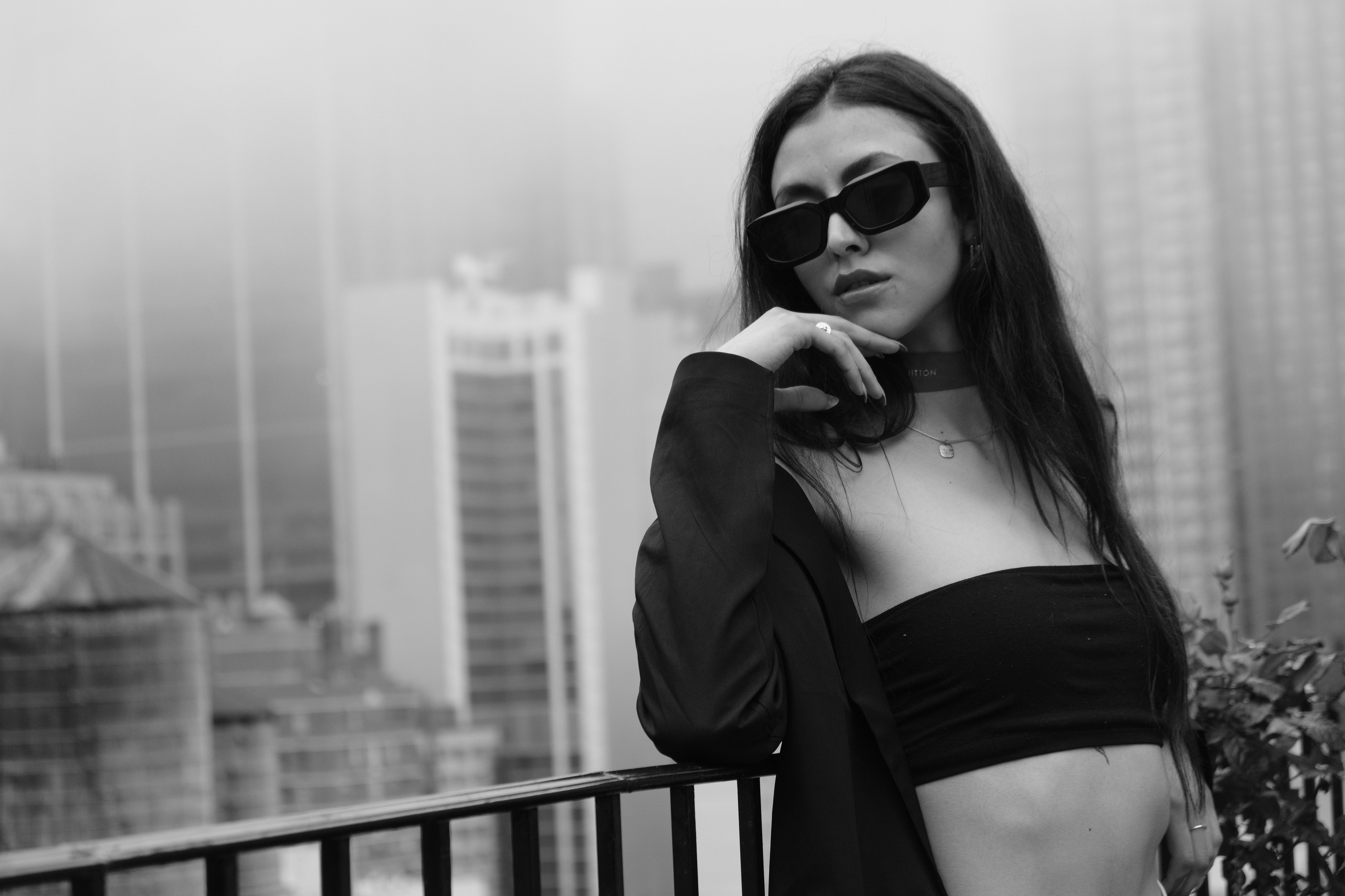 A Beautiful Woman in Black Coat and Dark Sunglasses · Free Stock Photo