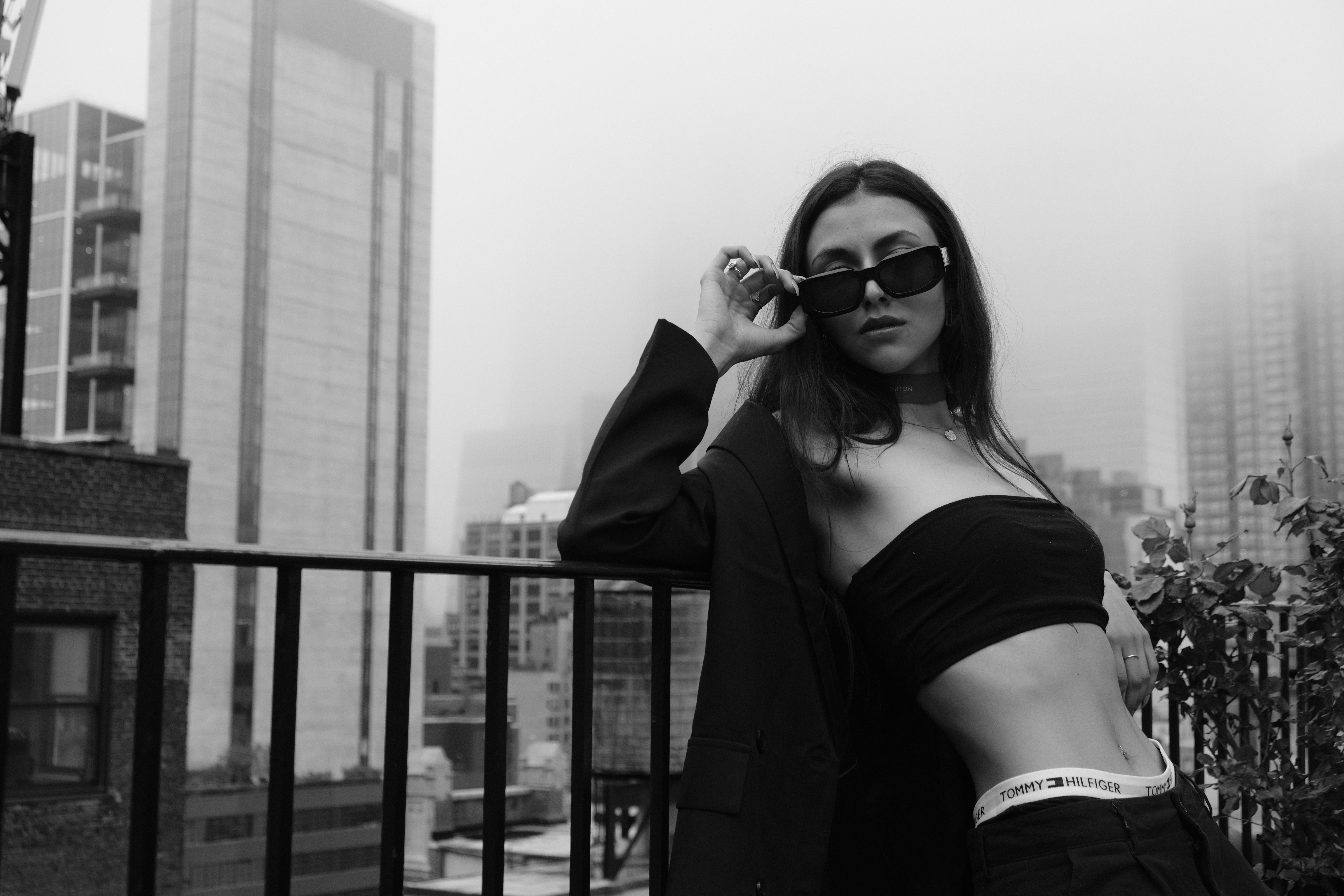 A Beautiful Woman in Black Coat and Dark Sunglasses · Free Stock Photo
