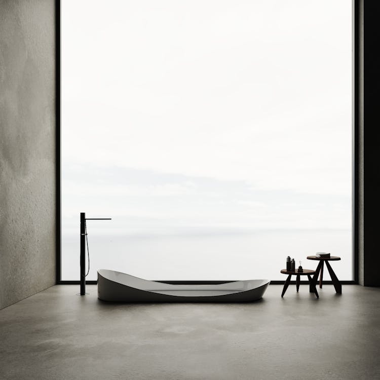 Free Minimalistic Bathroom with a Tub in the Floor Stock Photo