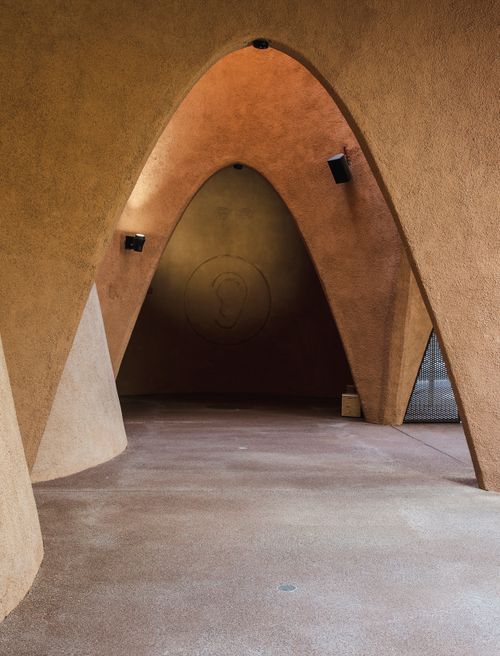 Free Interior view of abstract sculptural archways with soft lighting in Dubai, United Arab Emirates. Stock Photo