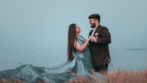 Elegant Couple Dancing on Field