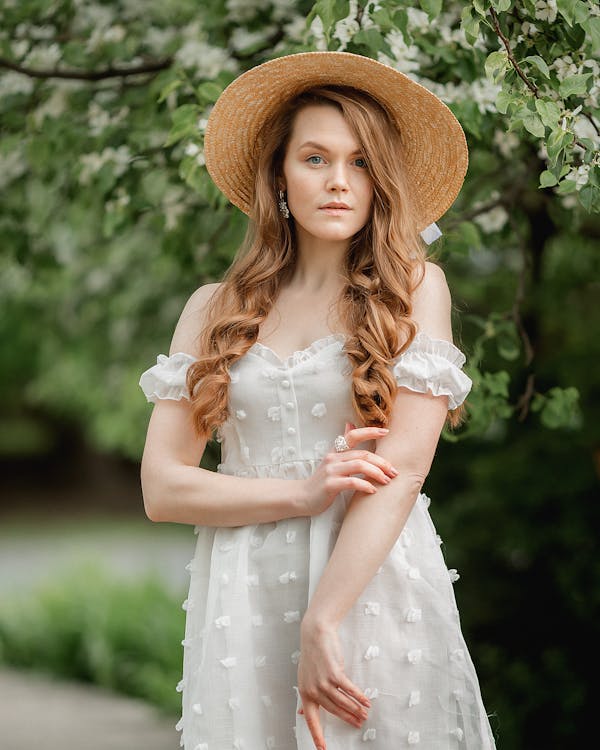 Woman in Dress and Hat · Free Stock Photo