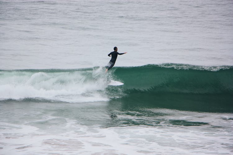 A Man Surfing 