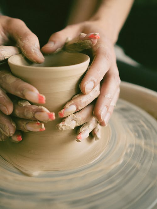 Close-up of Hands Forming Clay