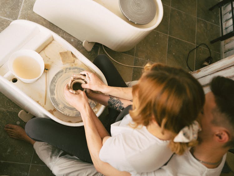 Couple Doing Pottery Together