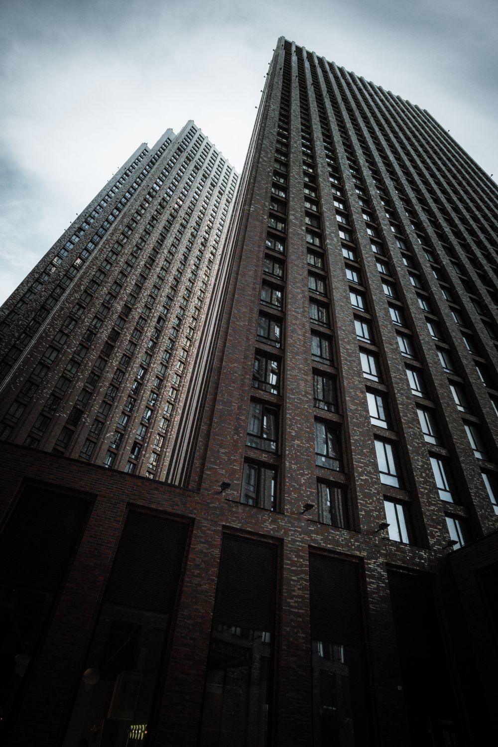 Two High Rise Building Low-Angle Shot of Two High Rise Buildings in the City · Free Stock Photo
