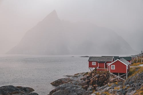Rocky Island Hidden in Fog off the Coast of Norway