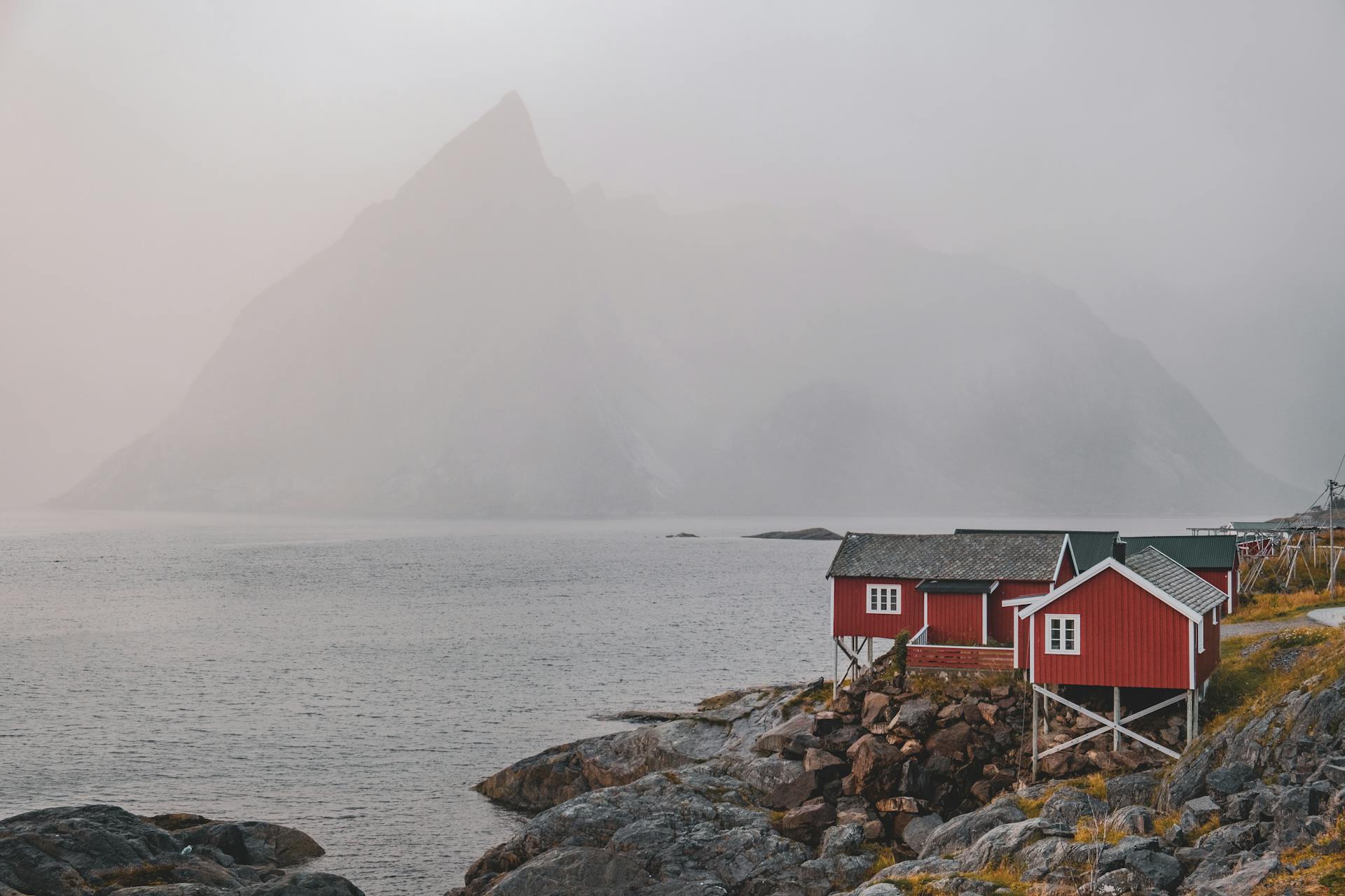 Rocky Island Hidden in Fog off the Coast of Norway