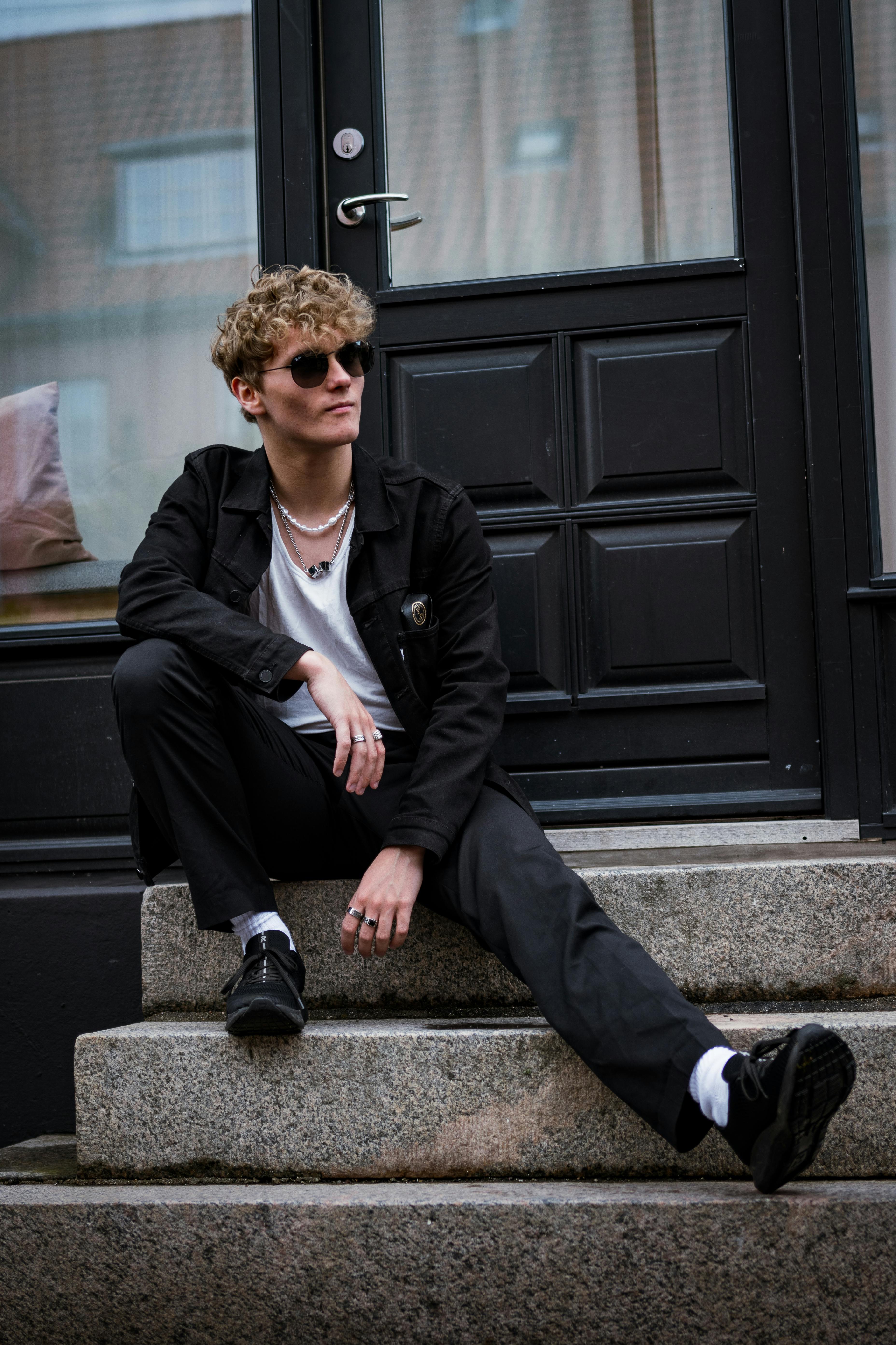 Person wearing an elegant, tailored outfit with timeless style