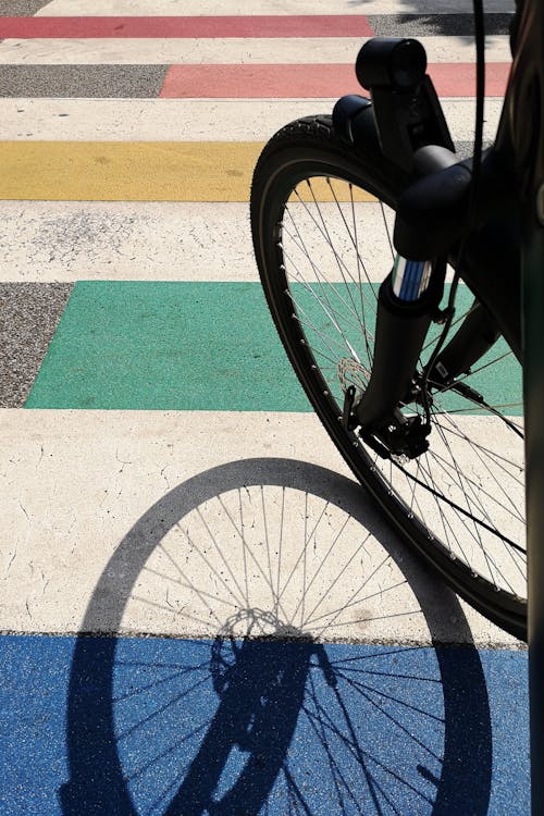 Free Black Bicycle on White and Green Stripe Floor Stock Photo