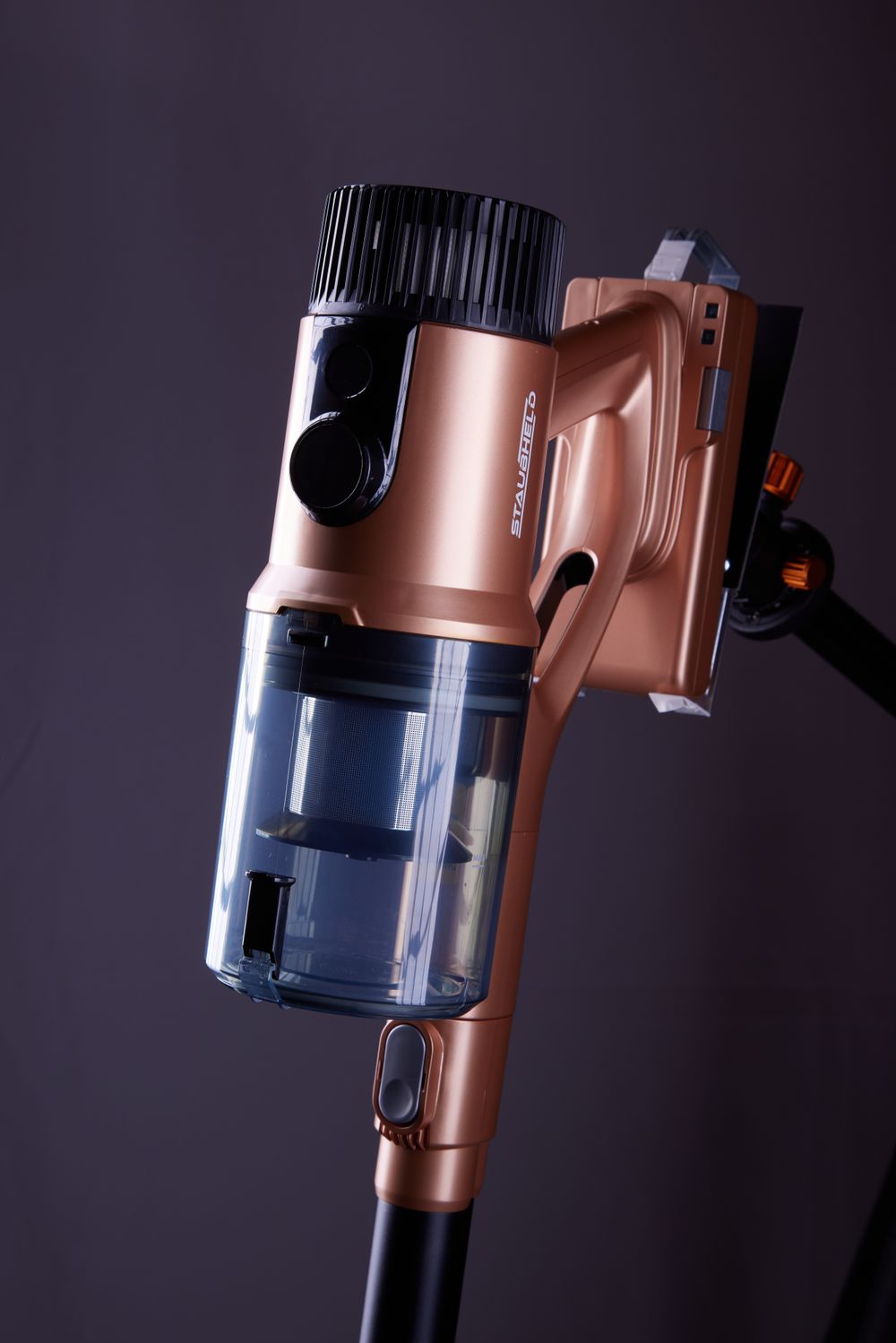 Elegant modern cordless vacuum cleaner in a clean living room