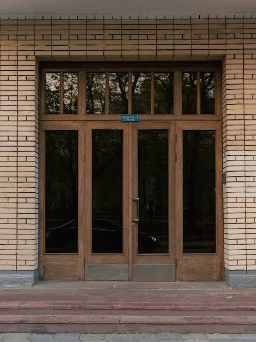 Wooden Doors with Glass Entrance to a Building 