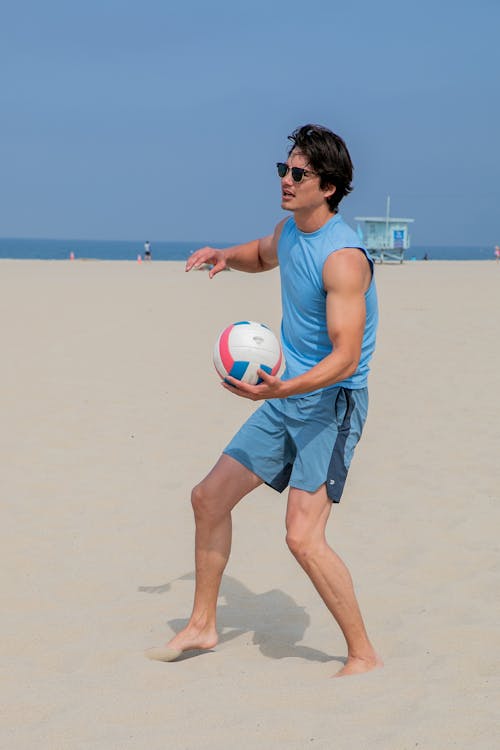 Man Playing Beach Volleyball 