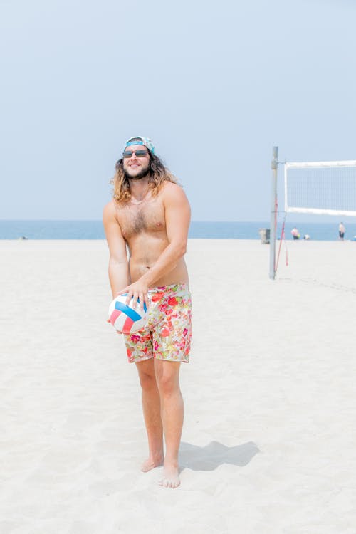 Man Playing Beach Volleyball 