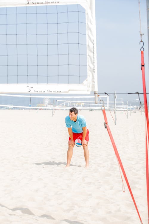 Man Playing Beach Volleyball