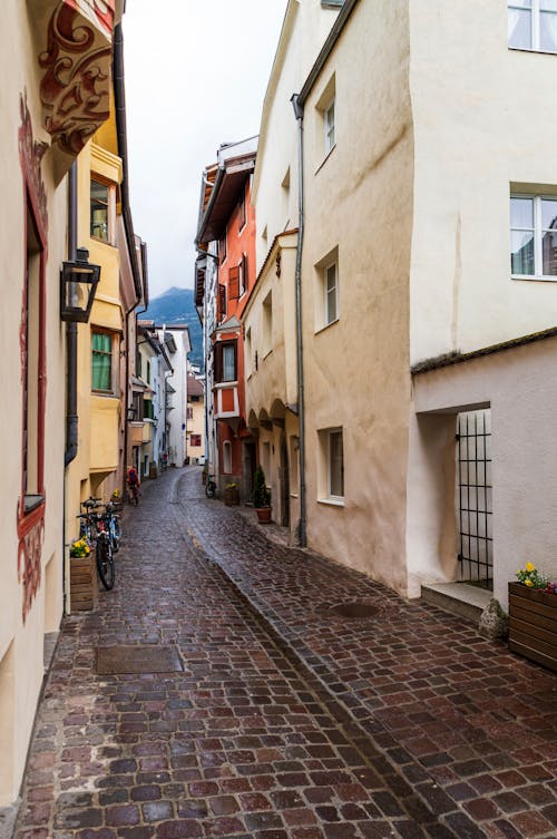 A Narrow Street in Between Buildings 