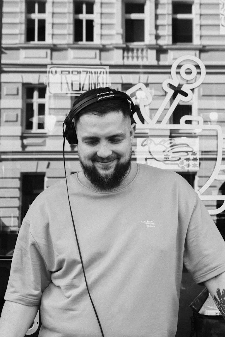 Grayscale Photo Of A Male Dj 