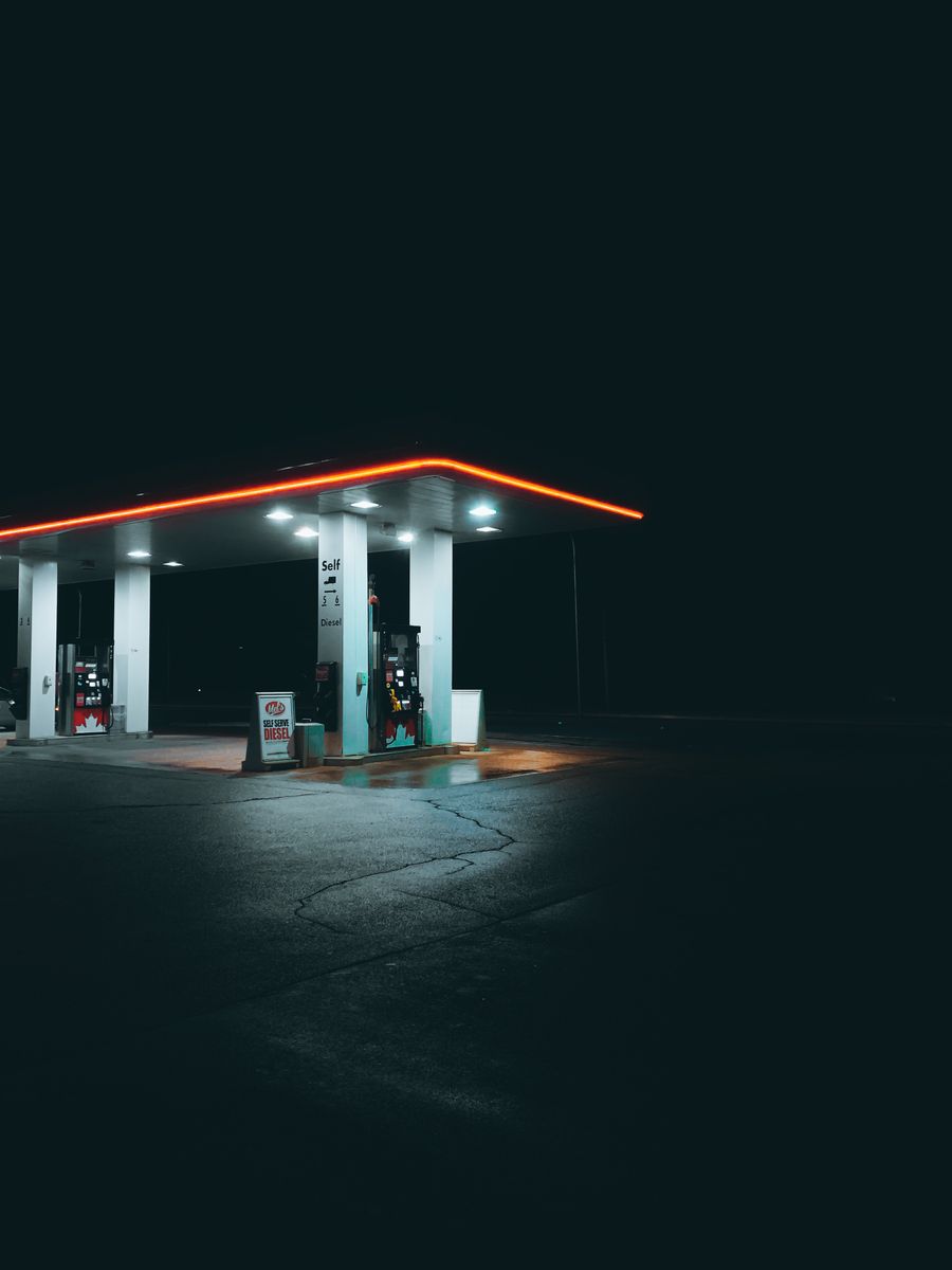 Modern gas station canopy illuminated at night