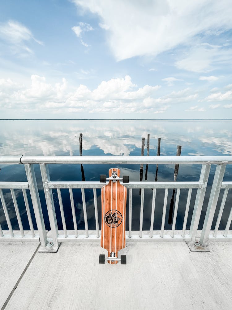 Skateboard On A Pier 