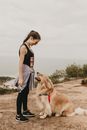 Woman and Dog Looking at Each Other 