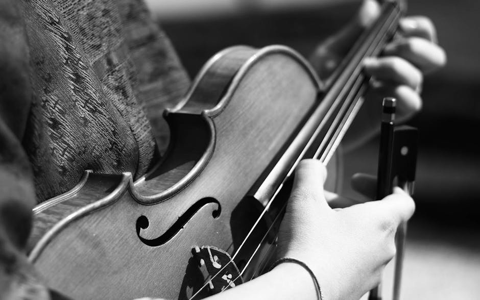 Grayscale Photography of Person Playing Violin
