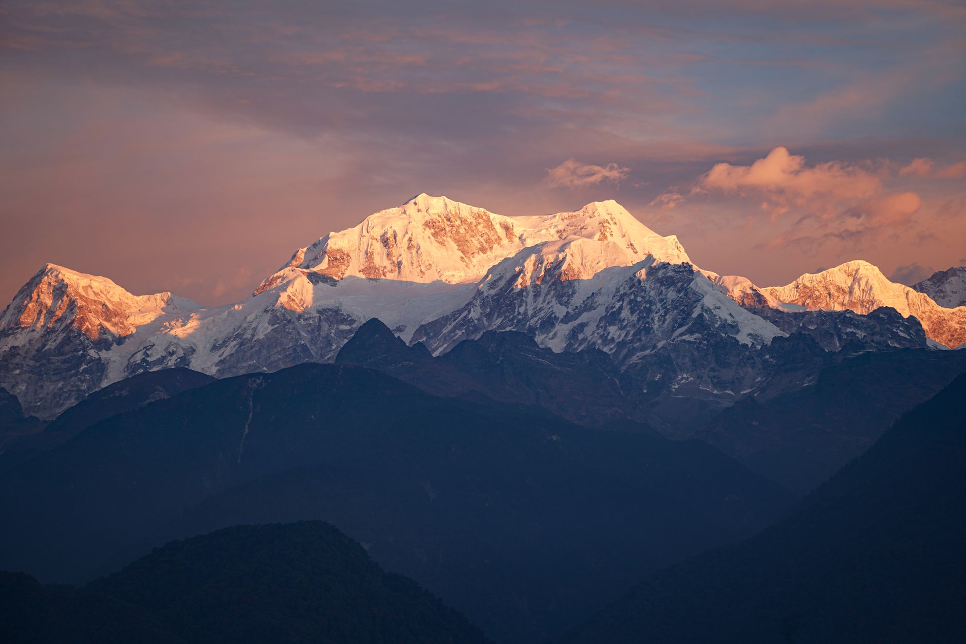 Snow-capped mountains during sunrise in Sikkim