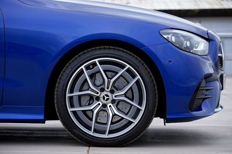 Close-up Of The Wheel Of A Blue Car